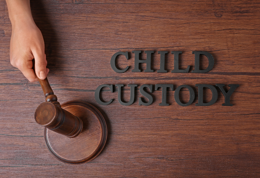 child custody words on table with gavel