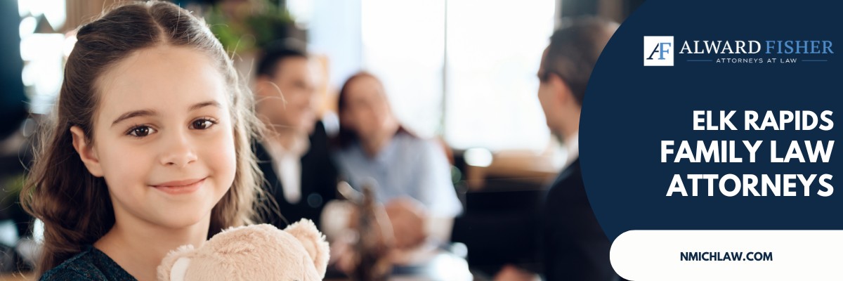 Smiling young girl holding a teddy bear in the foreground, with adults having a discussion in the background at a law office